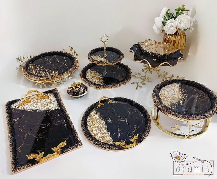 سرویس ظروف پذیرایی رزینی مشکی طلایی
