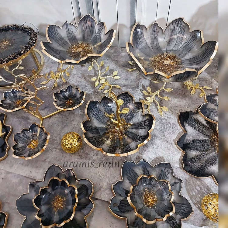 سرویس ظروف پذیرایی رزینی مشکی طلایی