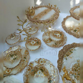 سرویس ظروف پذیرایی رزینی سفید طلایی بابونه سرویس کامل پدیرایی