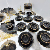 سرویس ظروف پذیرایی رزینی زمینه مشکی رگه طلایی ماربل