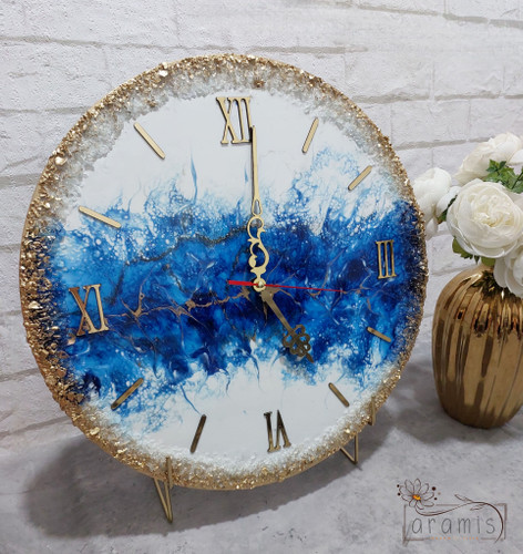 ساعت دیواری دایره ابی طلایی سفید رزینی